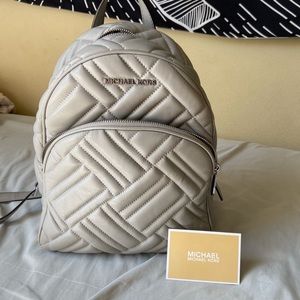 modern and chic grey michael kors mini backpack